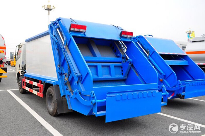 压缩垃圾车填装压缩机构的具体工作过程