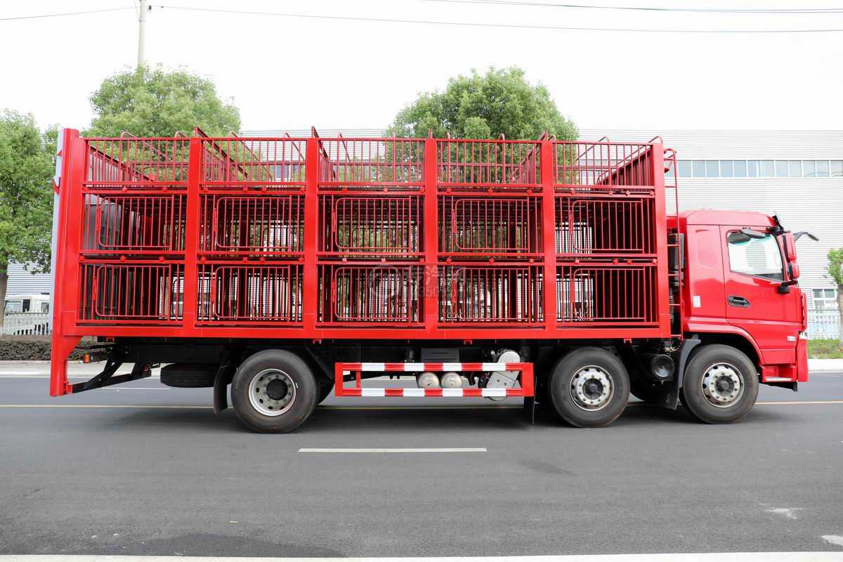 陕汽轩德翼6小三轴国六仓栅式畜禽运输车(红色)右侧图