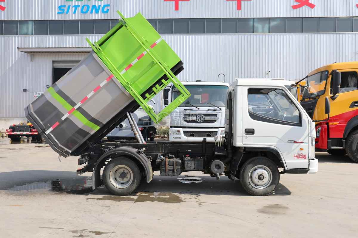 一汽解放霸铃国六自装卸式垃圾车上装箱体举升图