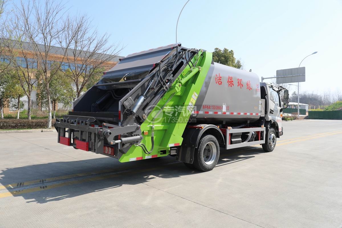 江淮駿鈴V7壓縮式垃圾車側后面圖