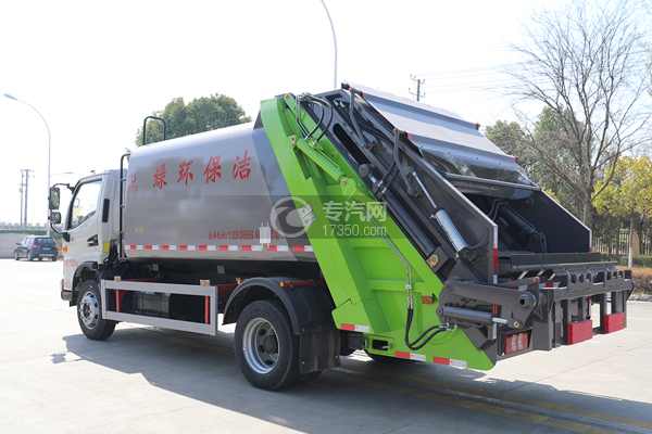 江淮駿鈴V7壓縮式垃圾車側后方圖
